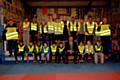 Dan Haydock of Expert Industrial with Hamer Boxing members wearing hi visibility waistcoats 