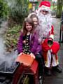 Mally and Fearne Halley with Father Christmas on the Springfield Park Model Train Santa Special