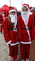 Elle Gregson-Howarth and Alex Lord compete in Santa dash