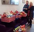 Andrea Ashton receives hampers from St Chad's Church