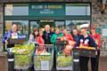 Andy O’Sullivan (Centre) with Morrisons staff and Martin Topham, Petrus Community (L)