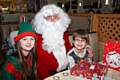 Oliver Thorne with Santa and his Elf