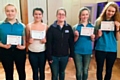 District Commissioner Gemma Orr (centre) presents Alyse Costello, Rachel Lopresti, Estelle Riley and Kimberley Taylor with the Baden-Powell Challenge Award