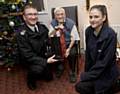 Chief Constable Ian Hopkins and a local police cadet with local residents