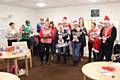 Tenants at Clough Court in Boarshaw join in with the carols