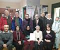 From left to right sitting: Ghulam Rasul Shahzad OBE,   Christine Mathewson, Shahbano Hassan, Sister Noel Barron,            
Caroline Lucas, 
Standing  Left to right: Derek Snowden, Bill Allott, Marica Gravovac, Councillor Mohammed Zaman, Naeem Khan,  
George Lee, Councillor Sameena Zaheer