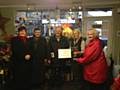 The Flower Borough winner of Littleborough's Small Business Saturday window dressing competition with Councillors Dearnley, Emsley, Hartley and Stott