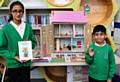 Pupils from Deeplish Primary Academy – Marium Yousaf (Year 6) and Hasan Ahmed (Year 2) with the road safety dolls house.