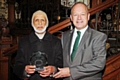 Rochdale Council of Mosques annual dinner<br />Mohammed Iqbal with Simon-Danczuk after collecting his award for voluntary services to the bereaved