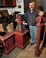 Cast Iron craftsman John Wade with the Mayoral Lamps that he is restoring for the Friends of Rochdale Town Hall