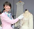 Natalie Rhodes (Art and Heritage Assistant-Museum) with the wedding dress detailed above 