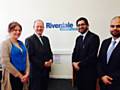 Simon Danczuk, Asif Khan and staff at the opening of Riverdale Insurance 