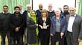 Cllr Mohammed Zaman, Linden and Samina Zaheer together with local community leaders present a Plaque to Val White, Chair of Forum Sohail Ahmad, and Vice Chair Ahmed Nawaz with Vera Lomax