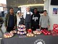 Hopwood Hall College business and catering students selling cakes. From left to right: Don Bhebe, Sophie Wells, Callum Shang, Ijaz Arain, Tevin Dewar