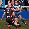 Dave Woods takes the ball to the Thatto Heath defence