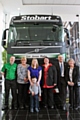 Phil McClure, Julie McClure, Rebecca Rigby, Jack Rigby, Carole Groves (Help for- Heroes Regional Manager), Raymond McClure and Diane McClure with the Stobart Truck named Lee James Rigby