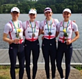 Brianna Stubbs, Ruth Walczak, Emily Craig and Eleanor Piggott smiling with delight after their win in the lightweight women’s quad in Essen, Germany