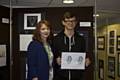 Kath Scully with Hopwood Hall College student Sam Pickering and his winning logo design