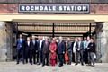 Representatives of Transport for Greater Manchester; Network Rail; Northern Rail and Rochdale Council at the new station entrance on Miall Street