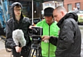 John Farrington (centre) filming his latest film in Rochdale