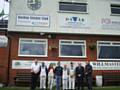 John Murphy, Chairman of Norden Cricket Club, Hopwood Hall college students Azeem Iqbal,  Kimberley Hudson,  painting & decorating tutor Richard Hastley, students Daniel Robinson and Owen Marsh,  Bobby Denning, Chief Executive of Lancashire County Cricket Club and plastering tutor Rob Wilson