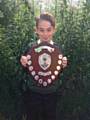 Jacob Simpson receives the first ‘The Tony MacSparran Award' at Woodland Community Primary School