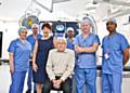 Sr. Susan Longden, Sister in charge of vascular theatres; Dr Simon Chadwick, consultant vascular anaesthetist; Sr. Susan Ashworth, theatre manager; Riza Ibrahim, clinical director of vascular surgery; Tim Barrett, chief radiographer and Dr Ranjeet Narlawar, consultant radiologist with patient Christopher Walsh