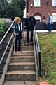 Elderly residents attempting to use the steep steps on Major Street, Milnrow