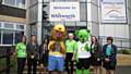 Science teacher Alison Howarth, Head Boy Daniel Heath, Head Girl Chloe Quigley, Whitworth Community High School mascot, Melissa Sutton, Humphrey Bear the hospital’s mascot, Head Girl Mia Howells and Carmel Sweeney from the school’s charity and community committee