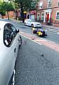 A collision between a taxi and a bike on Long Street in Middleton