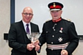 Holroyd Precision Chief Executive Officer, Dr Tony Bannan, receives the Queen’s Award for Enterprise from Warren J Smith Esq. JP, HM Lord-Lieutenant of Greater Manchester