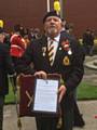 Ex-Rochdale councillor Tom Bailey with The Royal Regiment of Fusiliers’ Medal and Certificate of Merit