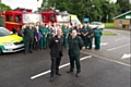 County Fire Officer and Chief Executive of GMFRS Peter O'Reilly and NWAS Head of Service Steve Hynes with staff from both GMFRS and NWAS at Highfield Ambulance Station in Farnworth