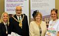 The Mayor and Mayoress of Rochdale, Councillor Surinder Biant and Councillor Cecile Biant, with the RBH team at Rochdale Over 55s’ Day