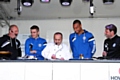 Rochdale AFC Manager Keith Hill, players Matty Lund and Ryhs Bennett and Assistant Manager Chris Beech give Chef Aazam Ahmad a helping hand at The Feel Good Festival