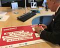 Dr Jon Lamonte, TfGM’S Chief Executive, signs the official Time to Change pledge on World Mental Health Day