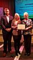 Amanda Almond and Margaret Ryan receive the Hopwood Park RHS Britain In Bloom award