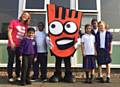 Children with Strider, Living Streets’ giant foot mascot