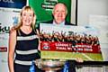 Jackie Meredith presents Hornets chairman Mark Wynn with a enlarged photograph of the team's celebrations following their triumph in Toulouse