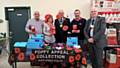 Ray Dutton (then Mayor of Rochdale) and Wing Commander David Forbes DL RAFVR(T) Rtd in Morrisons with poppy appeal collectors in 2016