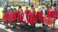 Beech House School Year 1 and Year 2 at the Remembrance Day Service at the War Memorial in Rochdale town centre.