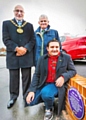 The Mayor of Rochdale, Councillor Surinder Biant with Frank Hauxwell from the Rotary Club of Rochdale East and (kneeling) Sebastian Lessandro from the Gracie Fields Appreciation Society