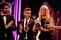 Karen Johnson accepts a Special Recognition Pride of Britain Award from Gary Barlow and Howard Donald of Take That