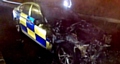 Lucky escape for police officer as patrol car goes up in flames