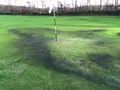 Damage to a green at Tunshill Golf Club