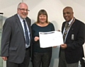 Rotarian John Kay with Kathy Thomas, CEO of RCT and the President of The Rotary Club of Rochdale, John Holder