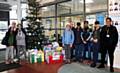 Students from Hopwood Hall College visit Key 103 to donate toys to children living in poverty