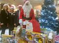 Helen Leach, Rochdale Children's Services; Jane Hughes and Ken Potter, Swansway Honda Rochdale; Santa Claus aka Matthew Wood