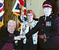 Colin Lee and his wife Marion Lee with Lieutenant Colonel Dixon MBE, TD, DL, Msc