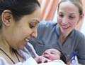 Jennifer Sager, lead midwife/infant feeding co-ordinator with new mum Nabeela Khan from Rochdale